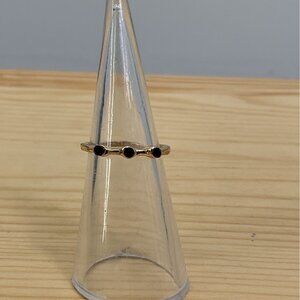 Minimalist Gold Tone Ring With Three Black Stones